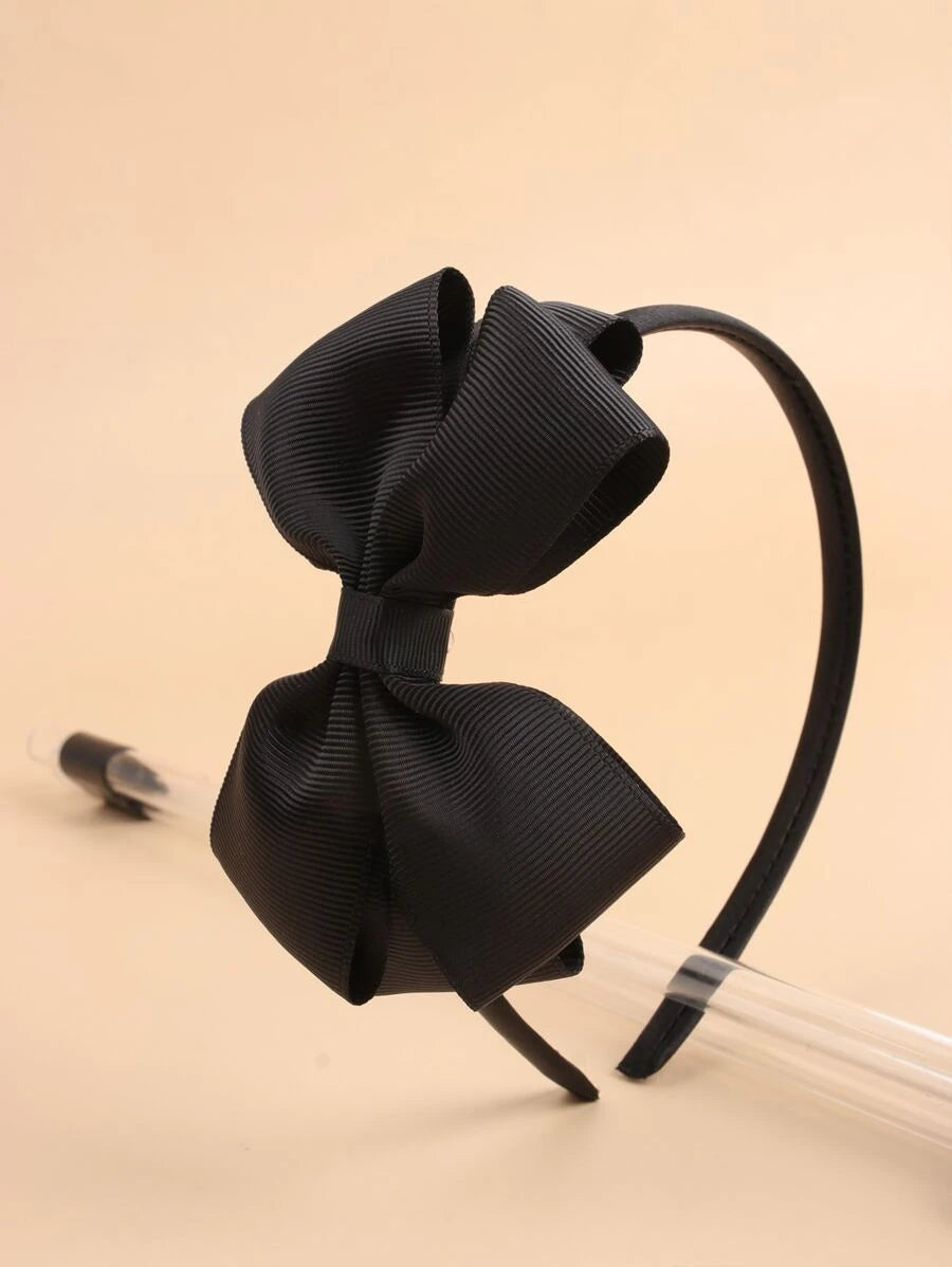 Bandeau noir avec nœud décoratif pour fille