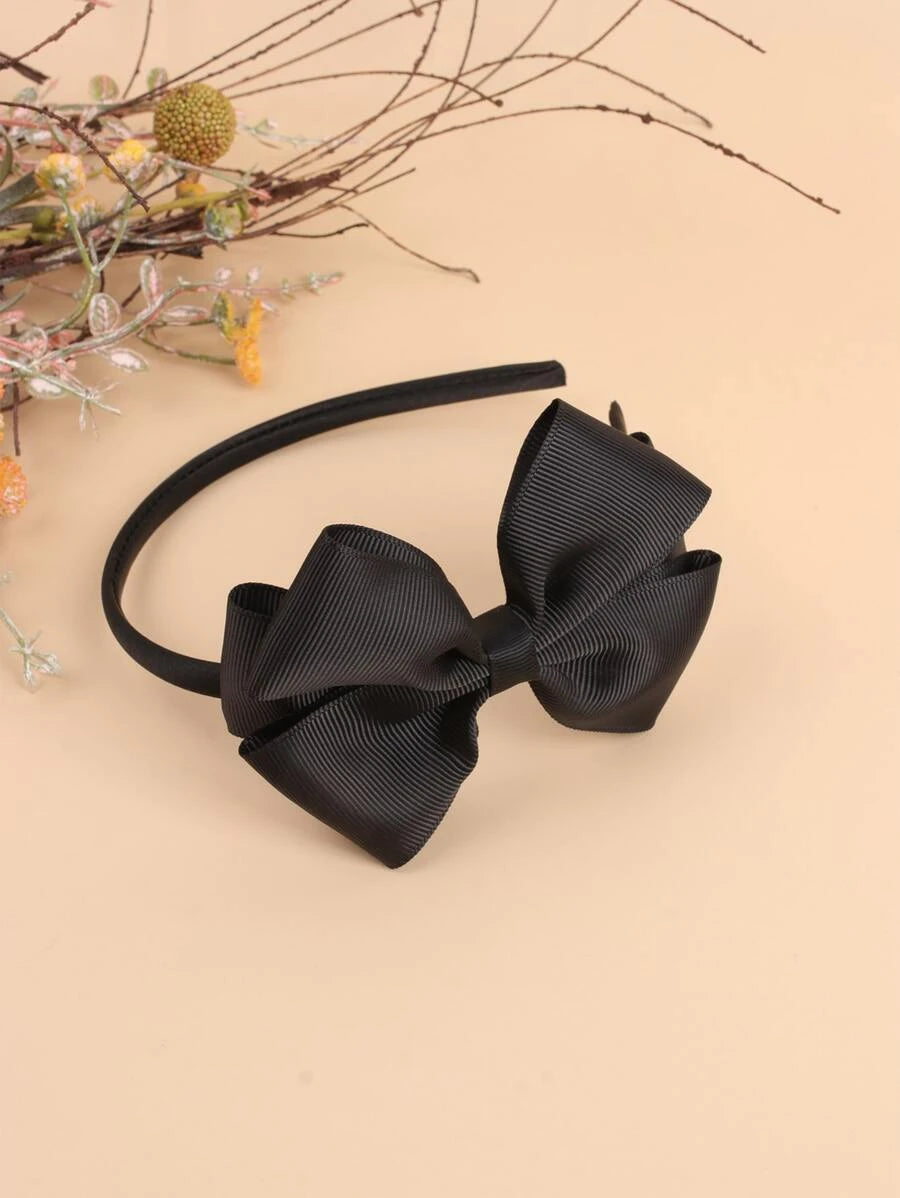 Bandeau noir avec nœud décoratif pour fille
