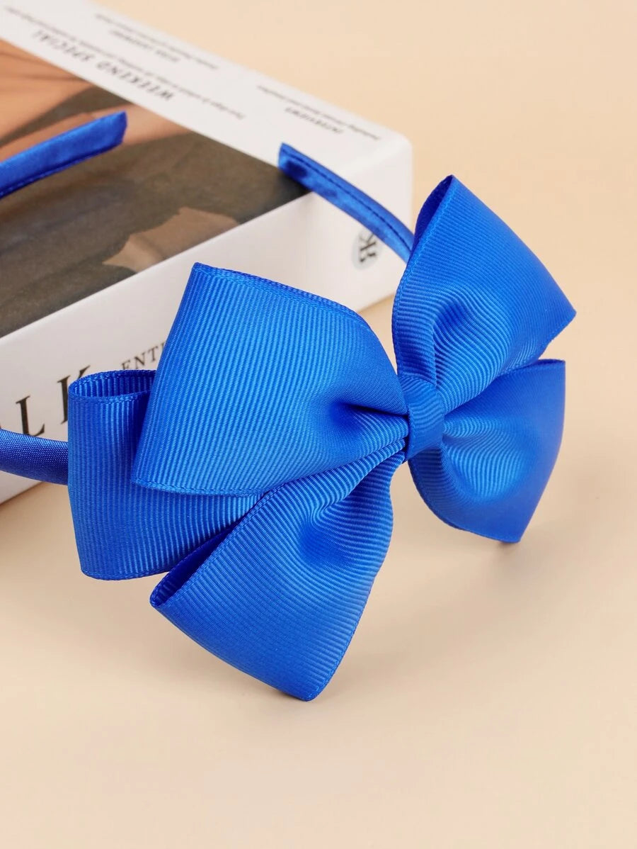 Bandeau bleu avec nœud décoratif pour fille